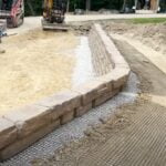 hidden-strength-behind-your-retaining-wall-geogrid-installation-by-riverscapes-outdoor-living-excavation-002
